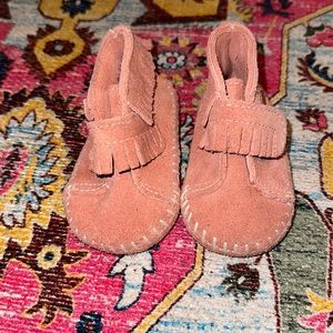 Dusty pink baby Minnetonkas. Infant size 2. Velcro closure.